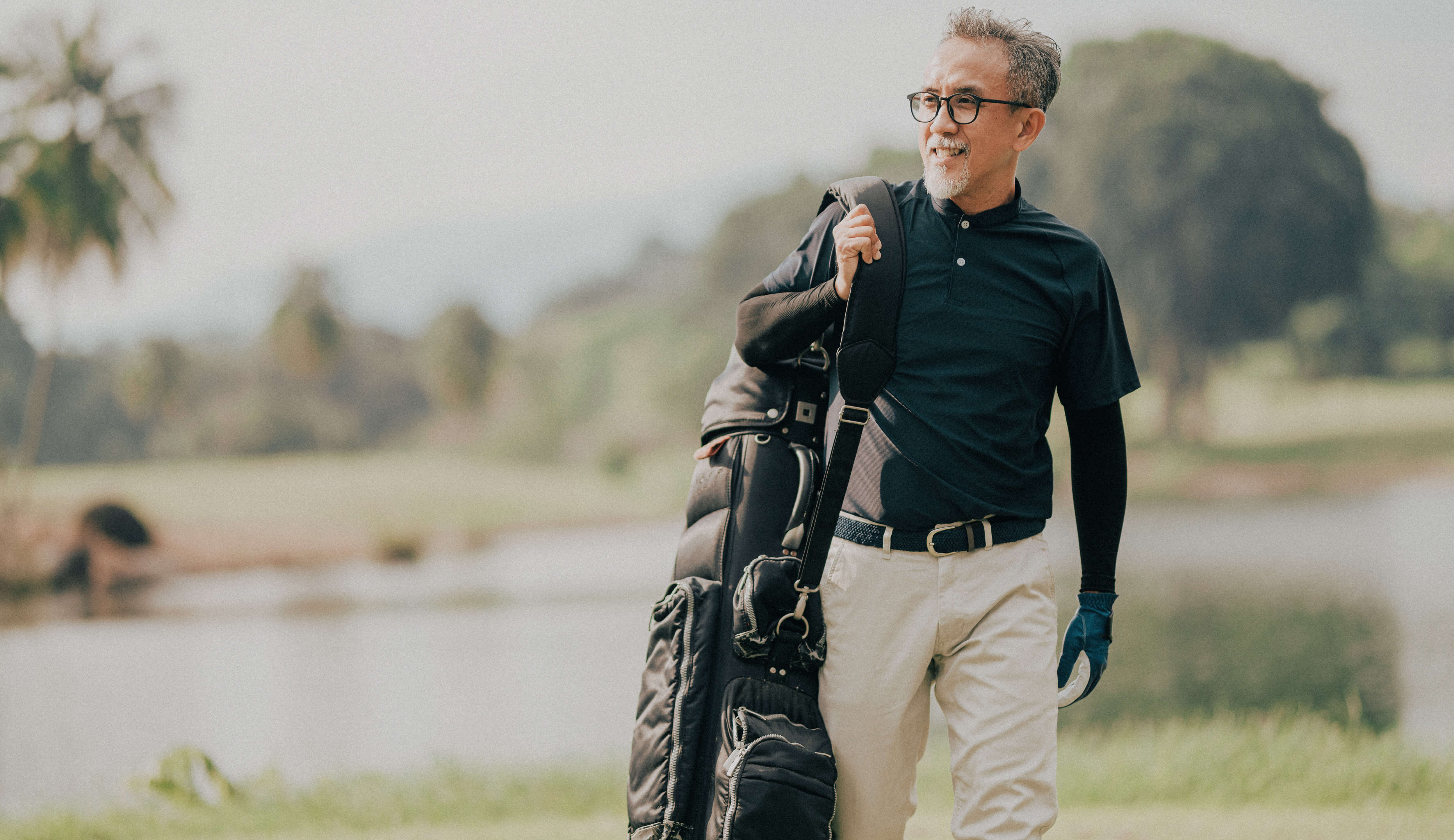 Man enjoying a game of golf, confident that his investments are positioned smartly.